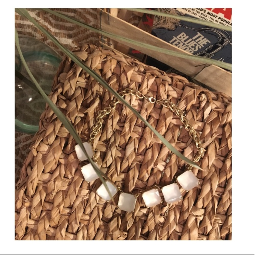 Square lightly rose colored necklace